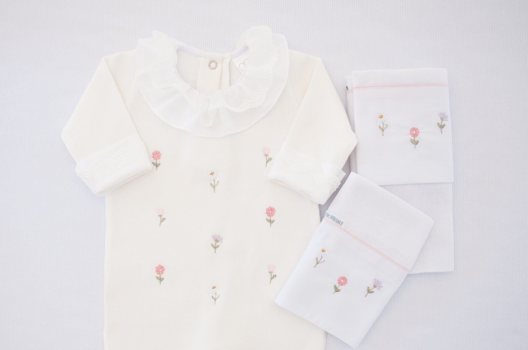 Macacão Bebê Jardim Sonhos Branco Buá